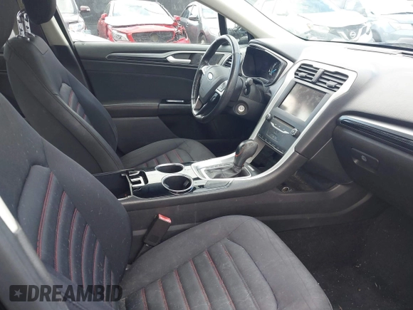 2013 Ford Fusion SE Hybrid z VIN 3FA6P0LUXDR181849, wystawiony jako IAAI lot #41949276 z przebiegiem 112 688 mil mil oraz . Historia ofert i sprzedaży dostępna na DreamBid. Obrazek 5.
