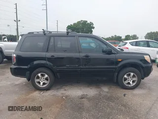 2007 Honda Pilot EX-L with VIN 5FNYF28577B028130, listed as a IAAI auction lot 42434714 with 179,299 mi miles and . Bid and sale history available at DreamBid. Image 13.