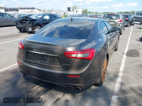 2015 Maserati Ghibli S Q4 with VIN ZAM57RTA7F1154097, listed as a IAAI auction lot 42568564 with 113,436 mi miles and . Bid and sale history available at DreamBid. Image 4.
