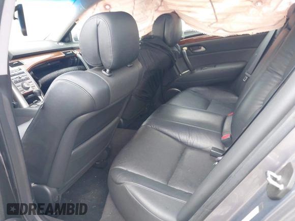 2005 Acura RL z VIN JH4KB16525C006978, wystawiony jako IAAI lot #41800979 z przebiegiem 213 501 mil mil oraz . Historia ofert i sprzedaży dostępna na DreamBid. Obrazek 8.