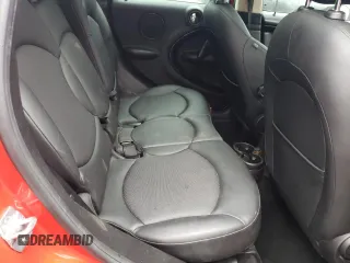 2014 MINI Countryman S with VIN WMWZC3C52EWP25379, listed as a Copart auction lot 61438355 with 76,943 mi miles and Salvage title. Bid and sale history available at DreamBid. Image 11.