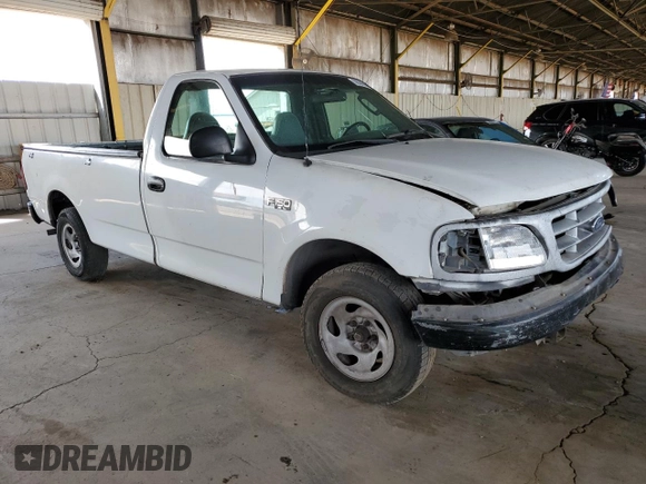 2003 Ford F-150 XL with VIN 1FTRF17243NB73840, listed as a Copart auction lot 58356935 with 332,670 mi miles and Salvage title. Bid and sale history available at DreamBid. Image 4.