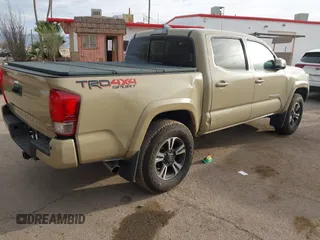 2017 Toyota Tacoma SR5 with VIN 3TMCZ5AN2HM063328, listed as a IAAI auction lot 41541775 with 137,610 mi miles and . Bid and sale history available at DreamBid. Image 4.