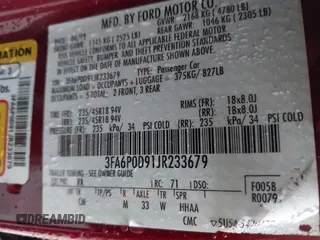 2018 Ford Fusion Titanium with VIN 3FA6P0D91JR233679, listed as a IAAI auction lot 42182140 with 100,706 mi miles and . Bid and sale history available at DreamBid. Image 9.