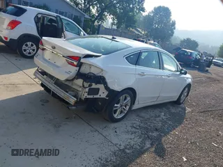 2018 Ford Fusion SE with VIN 3FA6P0HDXJR135927, listed as a IAAI auction lot 42645427 with 107,756 mi miles and . Bid and sale history available at DreamBid. Image 4.