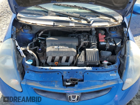 2007 Honda Fit with VIN JHMGD37407S044719, listed as a Copart auction lot 59192715 with 275,955 mi miles and Clean title. Bid and sale history available at DreamBid. Image 11.