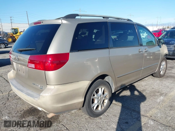 2005 Toyota Sienna LE with VIN 5TDBA23C75S032357, listed as a IAAI auction lot 41637161 with 169,415 mi miles. Bid and sale history available at carsss.com. Image 4.