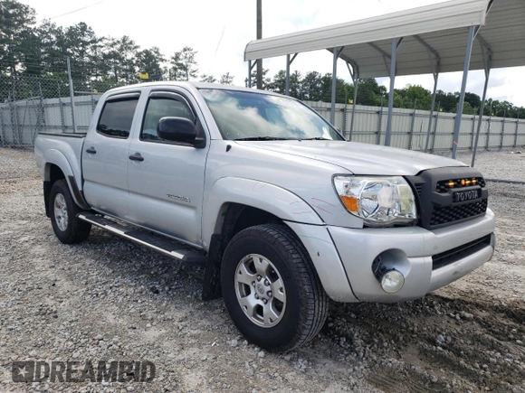 2010 Toyota Tacoma PreRunner with VIN 3TMJU4GNXAM094419, listed as a Copart auction lot 57757185 with 201,490 mi miles and Salvage title. Bid and sale history available at DreamBid. Image 4.