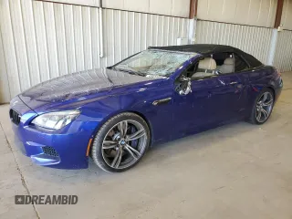 2015 BMW M6 z VIN WBSLZ9C54FD651463, wystawiony jako Copart lot #50922005 z przebiegiem Nie podano mil oraz Szkoda całkowita • Salvage title. Historia ofert i sprzedaży dostępna na DreamBid. Obrazek 1.