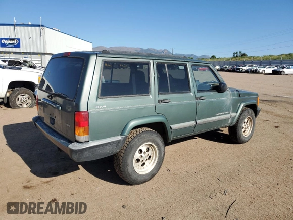 2000 Jeep Cherokee with VIN 1J4FF48S0YL198802, listed as a Copart auction lot 59996915 with 249,756 mi miles and Salvage title. Bid and sale history available at DreamBid. Image 3.