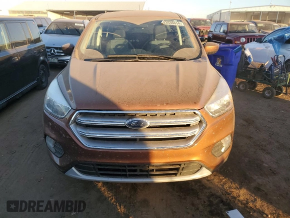 2017 Ford Escape SE with VIN 1FMCU9GD7HUE89317, listed as a Copart auction lot 83536654 with 121,939 mi miles and Clean Title. Bid and sale history available at carsss.com. Image 5.