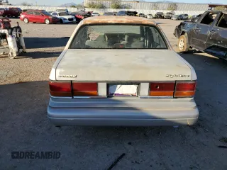 1991 Dodge Spirit z VIN 1B3XA5639MF549470, wystawiony jako Copart lot #76051284 z przebiegiem 62 309 mil mil oraz Szkody całkowita. Historia ofert i sprzedaży dostępna na DreamBid. Obrazek 6.