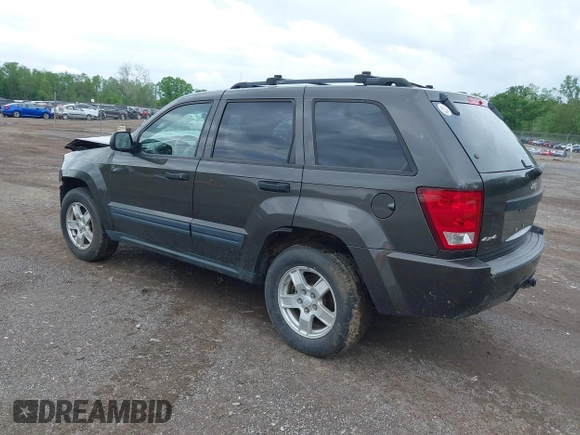 2005 Jeep Grand Cherokee Laredo z VIN 1J8GR48KX5C598646, wystawiony jako IAAI lot #42253900 z przebiegiem 197 848 mil mil oraz . Historia ofert i sprzedaży dostępna na DreamBid. Obrazek 3.