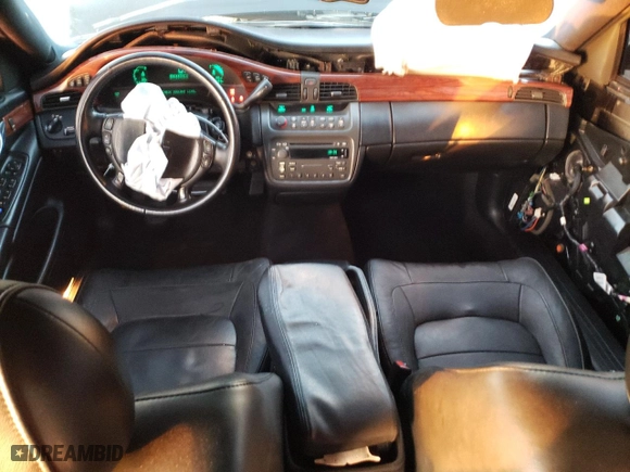 2005 Cadillac DeVille with VIN 1G6KD54Y45U165109, listed as a Copart auction lot 84695674 with 92,569 mi miles and Salvage Title. Bid and sale history available at carsss.com. Image 8.