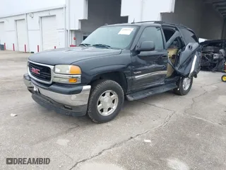 2005 GMC Yukon SLT with VIN 1GKEC13T15J221363, listed as a IAAI auction lot 41388170 with 233,577 mi miles. Bid and sale history available at carsss.com. Image 17.