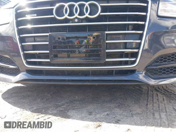 2016 Audi A8 L 4.0T Sport with VIN WAU43AFD1GN022253, listed as a IAAI auction lot 41858053 with 219,517 mi miles. Bid and sale history available at carsss.com. Image 6.