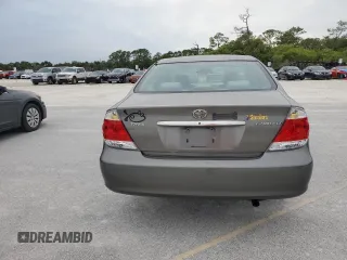 2006 Toyota Camry STD z VIN 4T1BE32K36U699650, wystawiony jako Copart lot #61942095 z przebiegiem 194 810 mil mil oraz Czysty tytuł • Clean title. Historia ofert i sprzedaży dostępna na DreamBid. Obrazek 6.