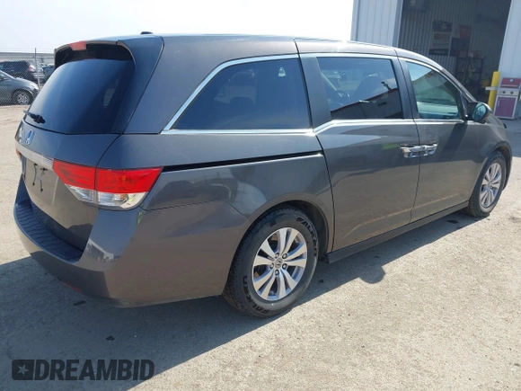 2014 Honda Odyssey EX-L z VIN 5FNRL5H64EB031426, wystawiony jako IAAI lot #41777542 z przebiegiem 162 426 mil mil oraz . Historia ofert i sprzedaży dostępna na DreamBid. Obrazek 4.