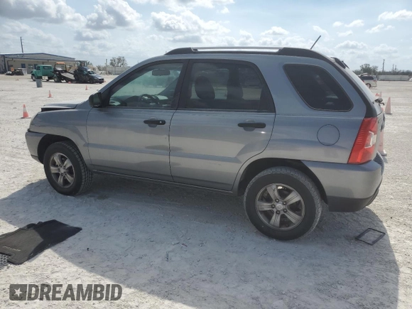 2009 Kia Sportage LX with VIN KNDJF724597601906, listed as a Copart auction lot 45317365 with 196,474 mi miles and Salvage Title. Bid and sale history available at carsss.com. Image 2.