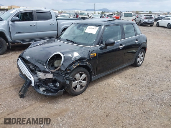 2015 MINI Hardtop 4 Door z VIN WMWXS5C58FT831568, wystawiony jako IAAI lot #42129819 z przebiegiem 76 044 mil mil oraz . Historia ofert i sprzedaży dostępna na DreamBid. Obrazek 18.