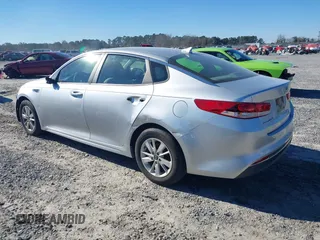 2016 Kia Optima LX with VIN 5XXGT4L37GG015462, listed as a IAAI auction lot 41247091 with 165,755 mi miles and . Bid and sale history available at DreamBid. Image 3.
