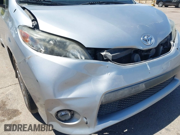 2014 Toyota Sienna SE with VIN 5TDXK3DC4ES491269, listed as a IAAI auction lot 42004485 with 118,516 mi miles and . Bid and sale history available at DreamBid. Image 6.