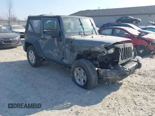 2014 Jeep Wrangler Sport with VIN 1C4AJWAG5EL271318, listed as a IAAI auction lot 41780040 with 128,942 mi miles and . Bid and sale history available at DreamBid. Image 1.