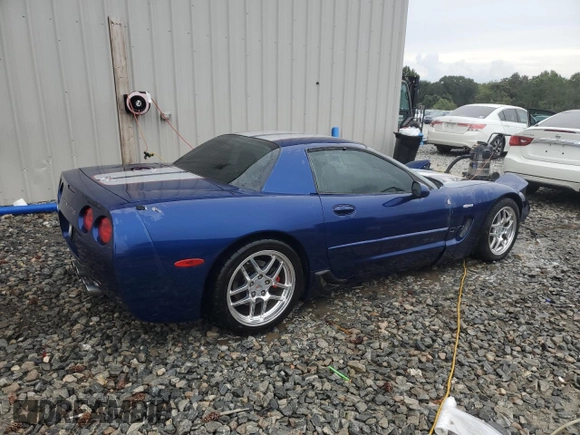 2004 Chevrolet Corvette Z06 with VIN 1G1YY12S045130166, listed as a Copart auction lot 74200864 with 69,691 mi miles and Salvage Title. Bid and sale history available at carsss.com. Image 3.