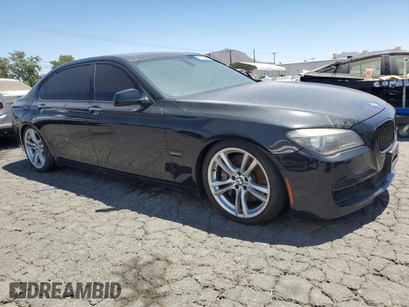 2011 BMW 7 Series 750Li with VIN WBAKB8C5XBCY66022, listed as a Copart auction lot 65729345 with 132,832 mi miles and Clean title. Bid and sale history available at DreamBid. Image 4.