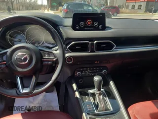 2021 Mazda CX-5 Touring with VIN JM3KFBCM9M0111998, listed as a Copart auction lot 54720195 with 54,398 mi miles and Clean Title. Bid and sale history available at carsss.com. Image 9.