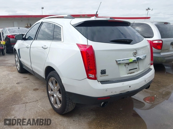 2013 Cadillac SRX Performance Collection z VIN 3GYFNDE38DS542736, wystawiony jako IAAI lot #42398648 z przebiegiem 266 059 mil mil oraz . Historia ofert i sprzedaży dostępna na DreamBid. Obrazek 3.