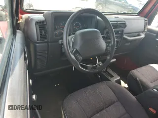 2001 Jeep Wrangler Sport with VIN 1J4FA49S51P365327, listed as a Copart auction lot 61720115 with 194,086 mi miles and Salvage title. Bid and sale history available at DreamBid. Image 8.