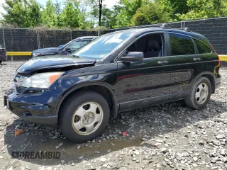 2011 Honda CR-V LX z VIN 5J6RE4H39BL035470, wystawiony jako Copart lot #56633825 z przebiegiem 236 341 mil mil oraz Szkoda całkowita • Salvage title. Historia ofert i sprzedaży dostępna na DreamBid. Obrazek 1.