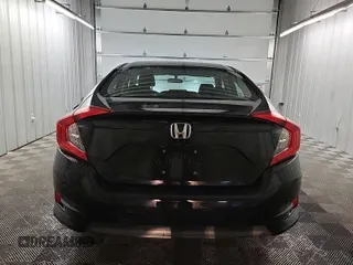 2017 Honda Civic LX with VIN 2HGFC2F58HH575889, listed as a IAAI auction lot 42285632 with 63,687 mi miles and . Bid and sale history available at DreamBid. Image 15.