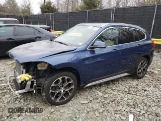 2021 BMW X1 xDrive28i z VIN WBXJG9C06M5T81056, wystawiony jako Copart lot #48388235 z przebiegiem 64 863 mil mil oraz Szkody całkowita. Historia ofert i sprzedaży dostępna na DreamBid. Obrazek 1.
