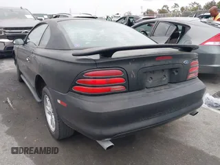 1994 Ford Mustang GT z VIN 1FALP42T0RF147393, wystawiony jako IAAI lot #42046032 z przebiegiem 184 504 mil mil oraz . Historia ofert i sprzedaży dostępna na DreamBid. Obrazek 3.