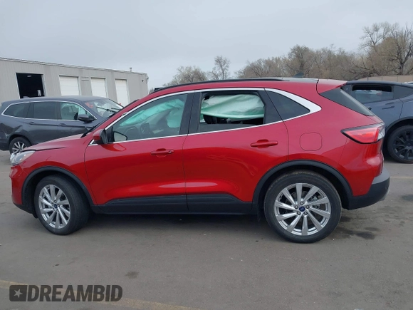 2021 Ford Escape Titanium Hybrid with VIN 1FMCU9DZ1MUA01599, listed as a IAAI auction lot 41912441 with 20,660 mi miles and . Bid and sale history available at DreamBid. Image 13.