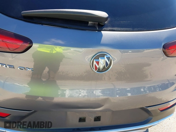 2020 Buick Encore GX Essence with VIN KL4MMFS23LB089458, listed as a IAAI auction lot 42205219 with 26,861 mi miles and . Bid and sale history available at DreamBid. Image 6.