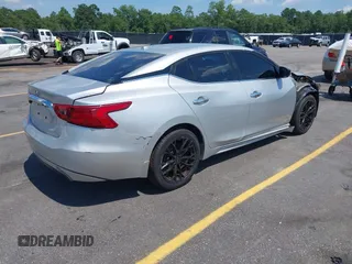 2017 Nissan Maxima Platinum with VIN 1N4AA6AP0HC405145, listed as a IAAI auction lot 42579108 with 138,114 mi miles and . Bid and sale history available at DreamBid. Image 4.