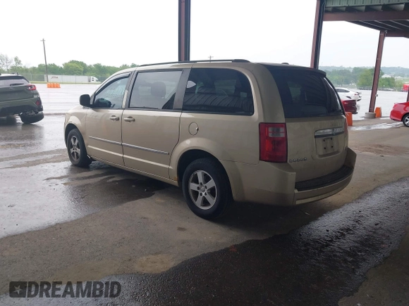 2010 Dodge Grand Caravan SXT with VIN 2D4RN5D17AR496854, listed as a IAAI auction lot 42210738 with 213,121 mi miles and . Bid and sale history available at DreamBid. Image 3.