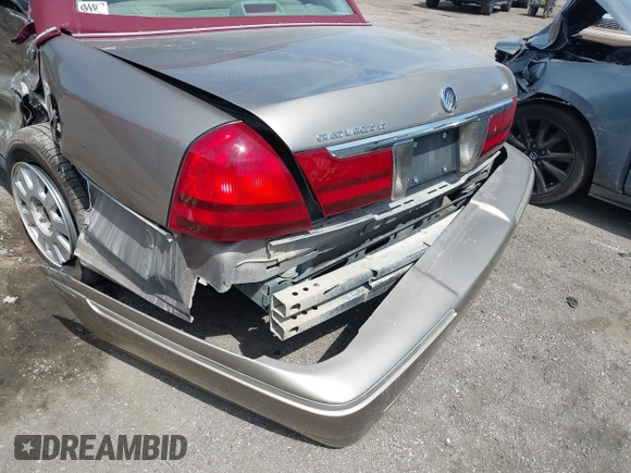 2004 Mercury Grand Marquis LS Premium z VIN 2MEFM75W34X674542, wystawiony jako IAAI lot #42018186 z przebiegiem 137 944 mil mil oraz . Historia ofert i sprzedaży dostępna na DreamBid. Obrazek 12.