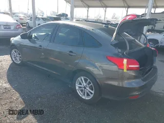 2018 Ford Focus SE with VIN 1FADP3F27JL285891, listed as a IAAI auction lot 41750264 with 103,815 mi miles. Bid and sale history available at carsss.com. Image 3.
