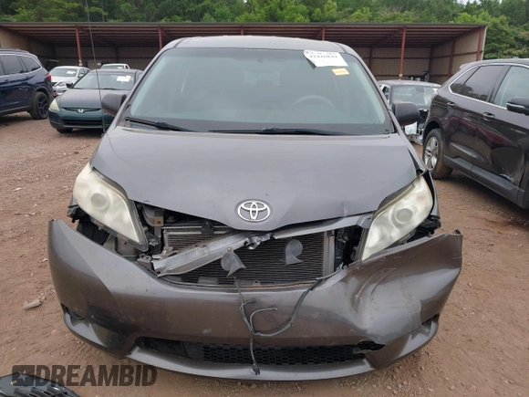 2014 Toyota Sienna L with VIN 5TDZK3DC8ES470837, listed as a IAAI auction lot 42426844 with 302,661 mi miles and . Bid and sale history available at DreamBid. Image 6.