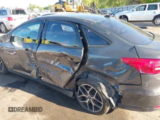 2018 Ford Focus SE with VIN 1FADP3FE0JL270966, listed as a IAAI auction lot 42206548 with 89,067 mi miles and . Bid and sale history available at DreamBid. Image 6.