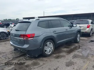 2019 Volkswagen Atlas SE with VIN 1V2WR2CA5KC514748, listed as a IAAI auction lot 42367164 with 57,827 mi miles and . Bid and sale history available at DreamBid. Image 4.