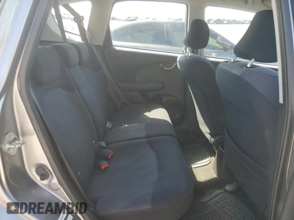 2009 Honda Fit Sport z VIN JHMGE88489S010278, wystawiony jako Copart lot #52251405 z przebiegiem 120 511 mil mil oraz Szkoda całkowita • Salvage title. Historia ofert i sprzedaży dostępna na DreamBid. Obrazek 10.