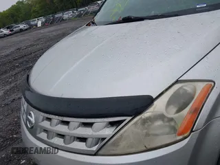 2003 Nissan Murano SE z VIN JN8AZ08W83W231298, wystawiony jako IAAI lot #42239796 z przebiegiem Nie podano mil oraz . Historia ofert i sprzedaży dostępna na DreamBid. Obrazek 10.