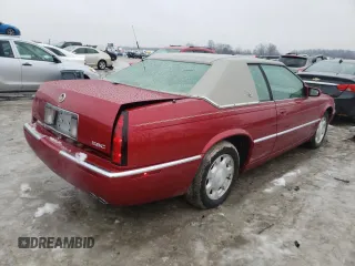 2001 Cadillac Eldorado ESC z VIN 1G6EL12Y61B107519, wystawiony jako Copart lot #38051744 z przebiegiem 52 018 mil mil oraz Czysty tytuł • Clean title. Historia ofert i sprzedaży dostępna na DreamBid. Obrazek 3.