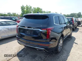 2021 Cadillac XT6 Premium Luxury with VIN 1GYKPDRS0MZ153523, listed as a IAAI auction lot 42770895 with 19,843 mi miles and . Bid and sale history available at DreamBid. Image 4.