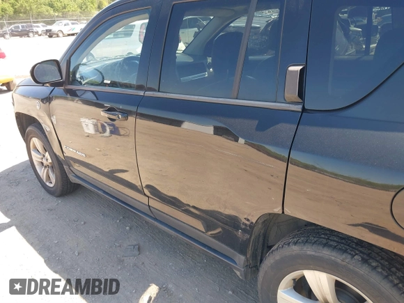 2014 Jeep Compass Latitude with VIN 1C4NJDEB9ED558420, listed as a IAAI auction lot 39277541 with 109,213 mi miles and . Bid and sale history available at carsss.com. Image 6.